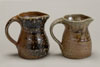A set of little sat-fired jugs in blue glaze.