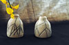 A set of little sat-fired jugs in blue glaze.